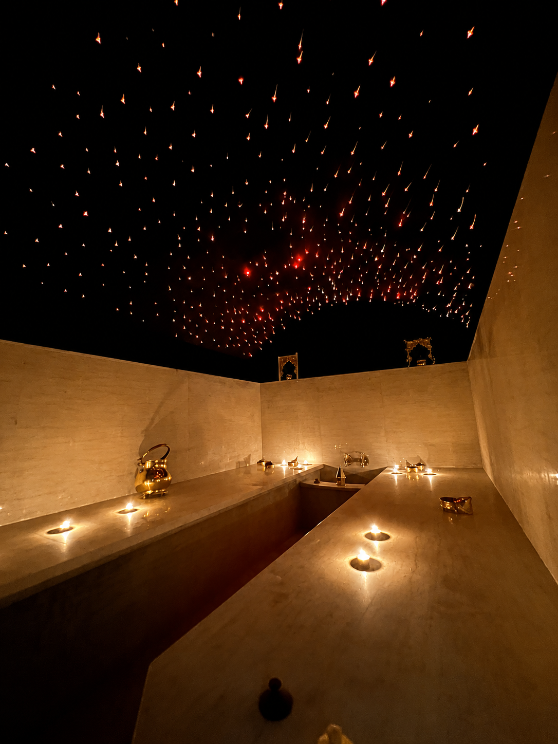 Signature Moroccan hammam ritual in Marrakech — candlelit private marble hammam at Mayzara Spa
